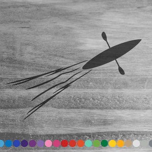 May include: A grayscale illustration of a kayak with a paddle, depicted from above, moving across a textured wooden surface. The kayak and paddle are black, with motion lines trailing behind the boat.