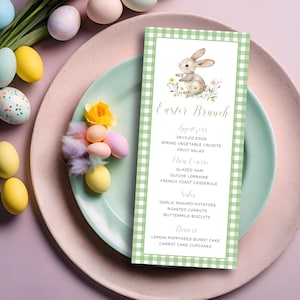 May include: A green and white gingham menu card featuring a bunny rabbit illustration. The menu lists the items for an Easter brunch, including starters, main course, sides, and dessert.