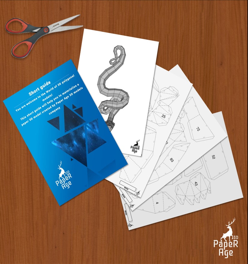 May include: A set of paper model instructions for a 3D paper model of a snake. The instructions are printed on white paper and include a short guide with the text "Short guide" and "You are welcome to the World of 3D polygonal models! This short guide will help you to materialize a paper 3D model created by Paper Age 30 models company." The instructions are from Paper Age.