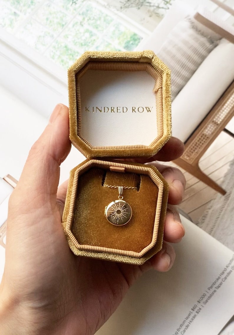 round gold sunshine engraved locket