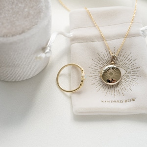 gold round sunshine locket