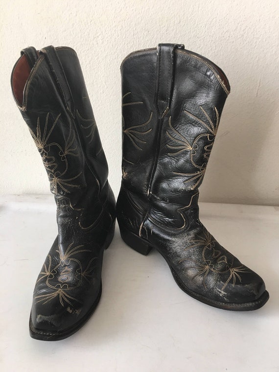 Black men's boots from leather shabby and genuine 
