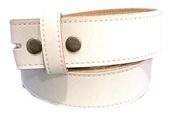 May include: A white leather belt with a buckle and two silver rivets. The belt is rolled up and the stitching is visible.