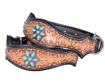 May include: Two leather dog collars with a light brown finish, adorned with turquoise flower-shaped accents and silver studs. The collars have black leather backing and a silver metal ring for leash attachment.