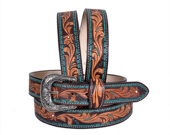 May include: A brown leather belt with turquoise and tan floral embroidery. The belt has a silver buckle with an ornate design.