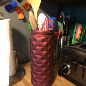 Tall Red Glass Jar with Surprised Mystery Item Inside