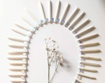 Aurora borealis iridescent light catching glass bead bone colored howlite spike dreamy modern bohochic earthy unique statement necklace