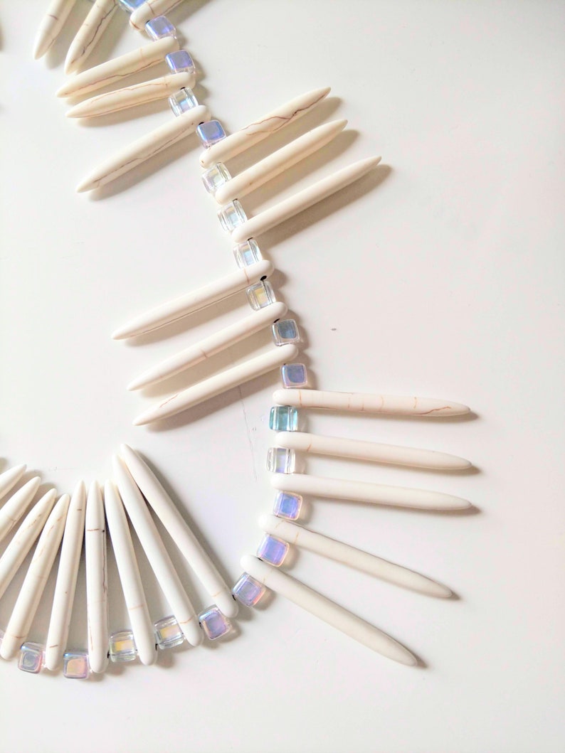 Aurora borealis iridescent light catching glass bead bone colored howlite spike dreamy modern bohochic earthy unique statement necklace