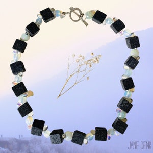 black lava cube and light catching glass beaded chunky statement necklace
