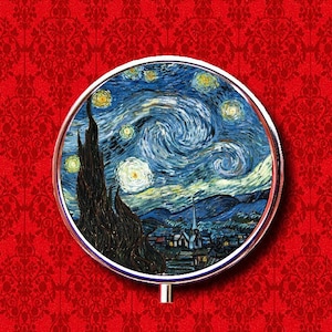 May include: A round, silver-framed trinket box with a colorful image of Vincent van Gogh's "Starry Night" painting.