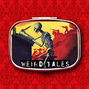 May include: A vintage-style metal tin with a colorful image of a skeleton writing at a desk. The text "Weird Tales" is printed on the front of the tin.