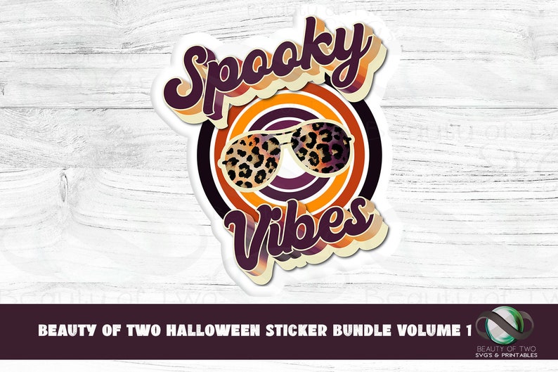 May include: A white sticker with a retro-style design featuring the text "Spooky Vibes" in purple with orange and yellow accents. The sticker also includes a pair of sunglasses with a leopard print design.