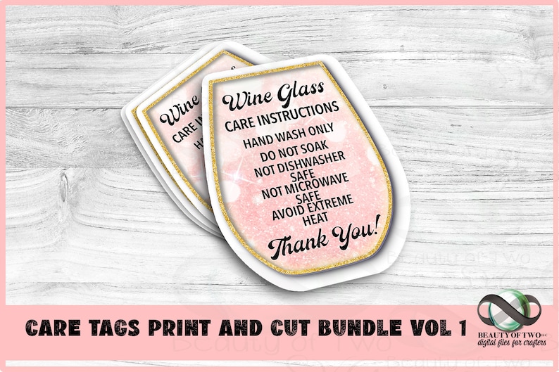 May include: A set of pink and gold wine glass care tags with the text "Wine Glass Care Instructions: Hand Wash Only, Do Not Soak, Not Dishwasher Safe, Not Microwave Safe, Avoid Extreme Heat, Thank You!"