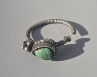 Antique Tibetan hoop earring in silver with turquoise, large teardrop shape, traditional men's work circa 1900 – Schmuckrausch Vintage 0032