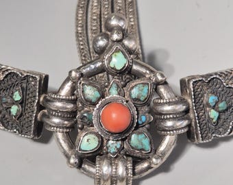 Antique Tibetan women's belt, silver, circa 1900, coral and turquoise Gankyil pendant, 295 grams, vintage jewelry.