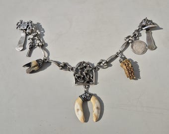 Antique charivari made of 800 silver with horse head and Saint George. Traditional jewelry for riders and collectors. 30 cm, 105 g.