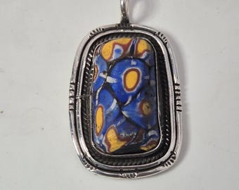 Vintage blue and yellow polka dot pendant made of antique trade beads, set in 925 silver, featuring a historic glass bead. SILVER AF Handmade Schmuckrausch Vintage 1955