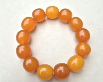 Elastic bracelet made of antique amber beads • Honey tones • Pressed amber USSR approx. 1950 • Ø 65mm • 39.59g • 876