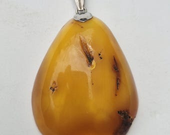 Antique Fischland pendant | Butterscotch amber in teardrop shape | 835 silver | signed | Germany around 1950 | 22.86g I 1450