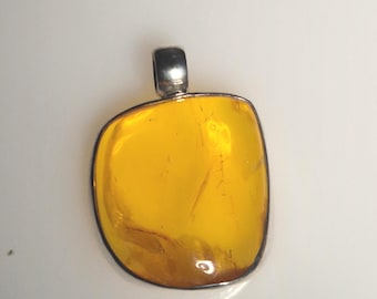 Amber pendant silver 925 – Tribal Spirit – clear honey amber with sunbursts – 33.5 mm – unique piece – 1723