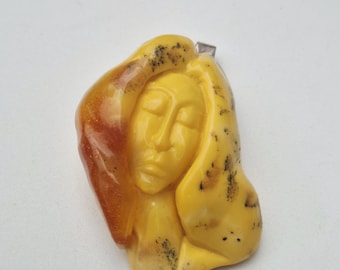 Large carved amber pendant | Woman's head motif | Butterscotch | Signed G 1998 | Silver loop | Unique jewelry