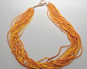 Antique seed bead necklace, 17 strands, made of European glass beads in orange-yellow, ethnographic Himalayan jewelry, Schmuckrausch Vintage 0054