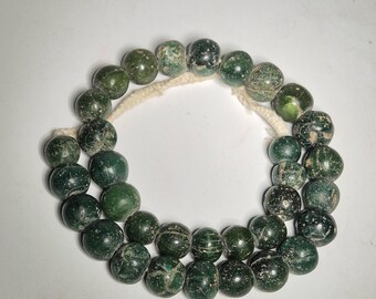 Strand antique glass beads Jatim Beads dark green no jade Java Indonesia 720