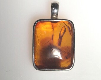 Amber pendant silver 925 – Tribal Spirit – square with branch print – cognac color & sunburst – 27mm – unique piece 1725