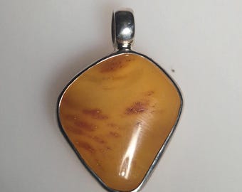 Amber pendant silver 925 – Tribal Spirit – Butterscotch with reddish inclusions – free form – 30mm – unique piece 1729