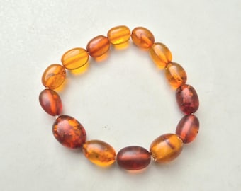 Antique amber bracelet • Flashed amber • Olive shape • 10.03g • Elastic • Irregular sizes • Upcycling • 846