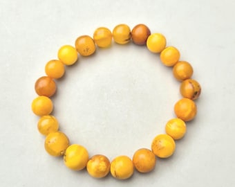 Elastic bracelet made of antique amber beads • Butterscotch • Baltic amber • Diameter 60mm • 10.76g • 885