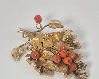 Antique traditional costume brooch in gilded silver with coral and grape leaves. Jewelry Rush Vintage 099