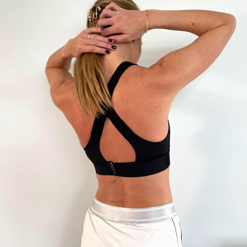 Sujetador deportivo con cierre frontal de alta compresión, sin rebote, ajustable. imagen 14