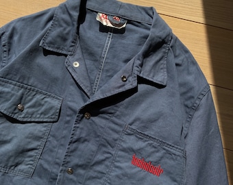 Chaqueta de trabajo vintage de 24" con botones a presión en algodón