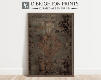 May include: A framed print featuring a distressed, vintage-style rug design. The artwork showcases a muted color palette of gray, brown, and rust, with a central medallion pattern. The frame is a dark wood. The text "D. Brighton Prints" is at the top.