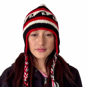 Himalayan Sherpa woolen hat. Ear flap hand knitted extra warm trapper hat. Wool outside & itching free breathable soft microfleece inside it