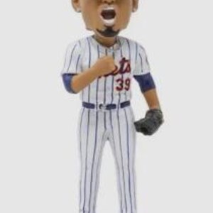 May include: A baseball bobblehead figurine of Edwin Díaz in a New York Mets uniform. The figurine is wearing a blue cap with the Mets logo, a pinstriped jersey with the number 39, and a baseball glove. The base reads "EDWIN DÍAZ".