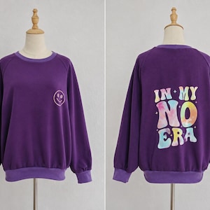 Suéter infantil oversized aconchegante da era "No My No" com estampa marcante e frases inspiradoras. Suéter com estampa estética e frase personalizada.