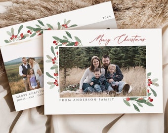 May include: Christmas cards featuring family photos, adorned with watercolor holly and berries. The cards display the text "Merry Christmas" and "From Anderson Family". One card shows the year "2024".