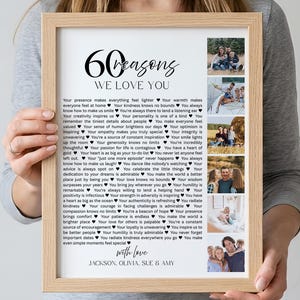 May include: A framed print with the text "60 Reasons We Love You" and family photos. The print has a light wood frame and includes a list of reasons and the names Jackson, Olivia, Sue & Amy.