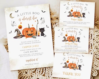 May include: Halloween-themed baby shower invitations and cards. The design features a pumpkin, witch hat, black cat, and ghosts. The text reads "A Little Boo is almost due" and includes details for the shower.