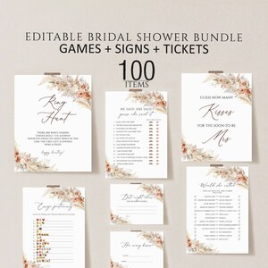 Könnte beinhalten: Druckbare Brautduschen-Spielkarten mit Boho-Thema. Die Karten zeigen ein florales Design mit getrocknetem Pampasgras und haben Text, der "Ring Hunt", "He Said, She Said", "Guess How Many Kisses", "Emoji Pictionary", "Date Night Ideas" und "Would She Rather" lautet.