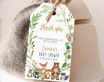 Op de afbeelding: Een wit bedankkaartje met een groene bladrand en bosdieren. De tekst luidt "Bedankt voor het overladen met liefde voor Carmens babyshower. 24 juli 2024".