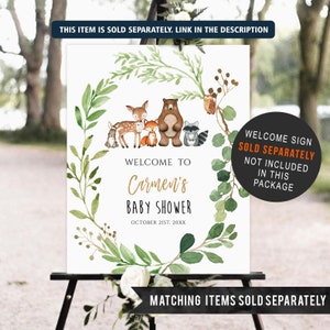 May include: Welcome sign for a baby shower with a woodland theme. The sign features a wreath of green leaves and branches with a deer, fox, bear, raccoon, and owl. The text reads "Welcome to Carmen's Baby Shower October 21st, 20XX".