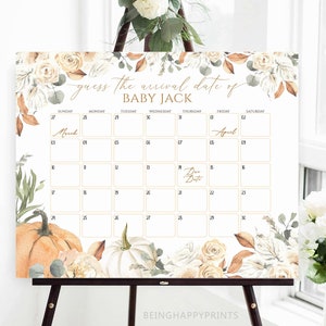 May include: A white calendar with the text "guess the arrival date of BABY JACK" and a floral and pumpkin design. The calendar has a grid for the months of March and April, with the words "Due Date" written on one of the squares.