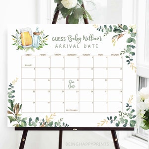 Pode incluir: Um jogo de chá de bebê imprimível com um calendário para os convidados adivinharem a data de chegada do bebê. O calendário é decorado com folhas verdes e detalhes dourados. O texto no cartaz diz "Adivinhe a data de chegada do bebê William".
