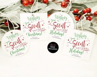 May include: Four white gift tags with the text "Wishing you a Scent-sational Christmas!" and "Wishing you a Scent-sational Holiday!" in red and green. The tags are in various shapes and sizes, with a string attached. The words "All 4 Tags Included" are in a black circle.