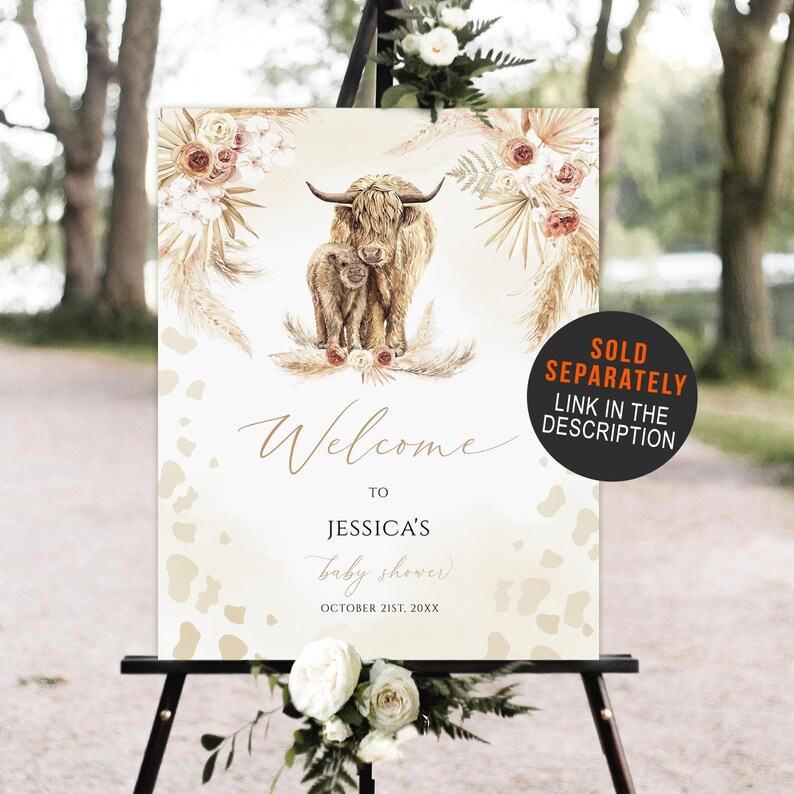 May include: Welcome to Jessica's baby shower sign with a watercolor illustration of a Highland cow and calf with floral accents. The sign is decorated with a beige and brown animal print pattern. The text on the sign reads "Welcome to Jessica's baby shower October 21st, 20XX".