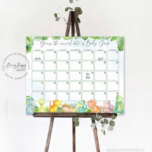 May include: A printable baby shower game calendar with a jungle theme. The calendar is decorated with green leaves and dinosaurs. The text on the calendar reads "Guess the arrival date of Baby Jack".