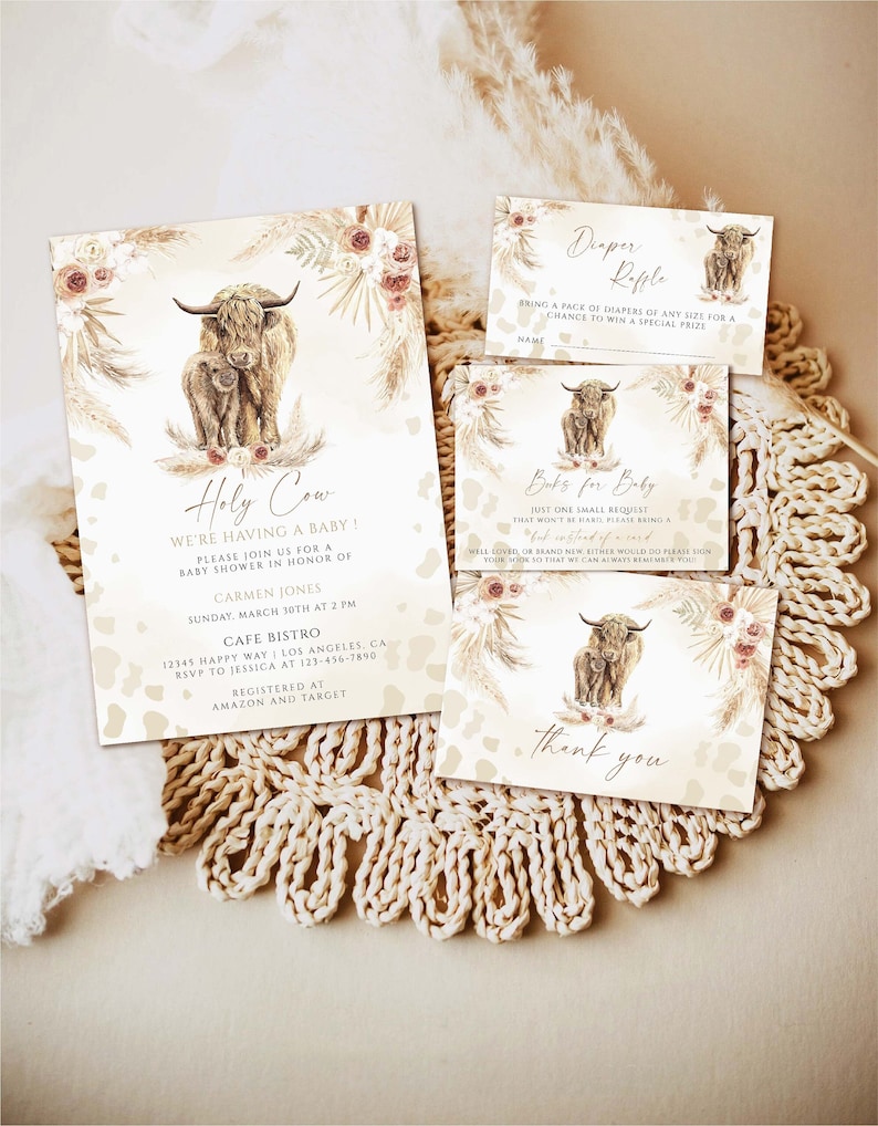 May include: A baby shower invitation with a watercolor illustration of a Highland cow and calf. The invitation is decorated with floral elements and a cow print pattern. The text reads "Holy Cow! We're having a baby!" and includes details about the shower, including the date, time, location, and registry information.